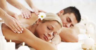 Young couple is having a back massage at the spa centre. 

[url=http://www.istockphoto.com/search/lightbox/9786786][img]http://dl.dropbox.com/u/40117171/couples.jpg[/img][/url]